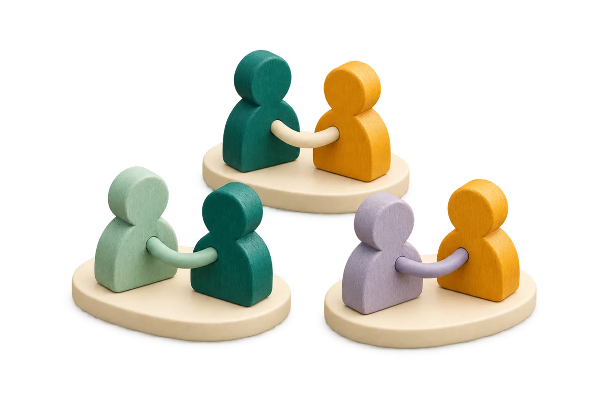 Six participant tokens arranged into three separate pairs on small oval bases